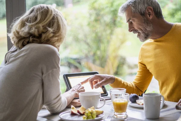 couple looking at mobile device